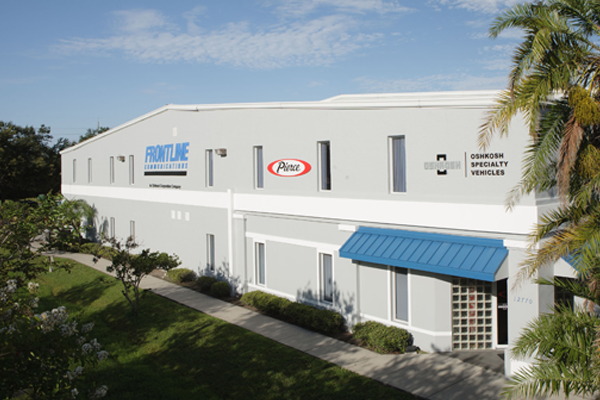 Exterior of the Frontline Communications building on a sunny day.
