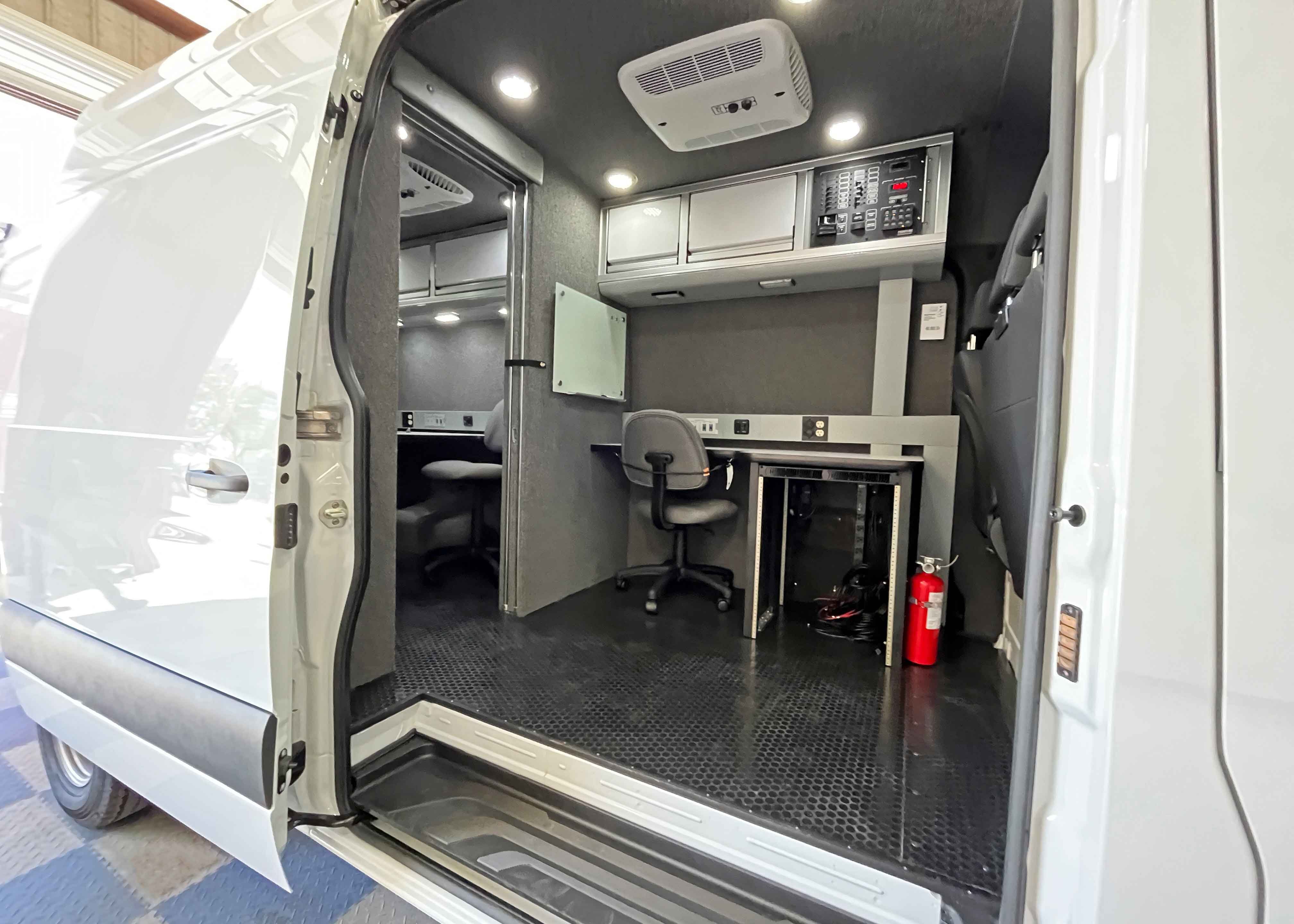 The interior of a Frontline Communications hostage negotiation vehicle.