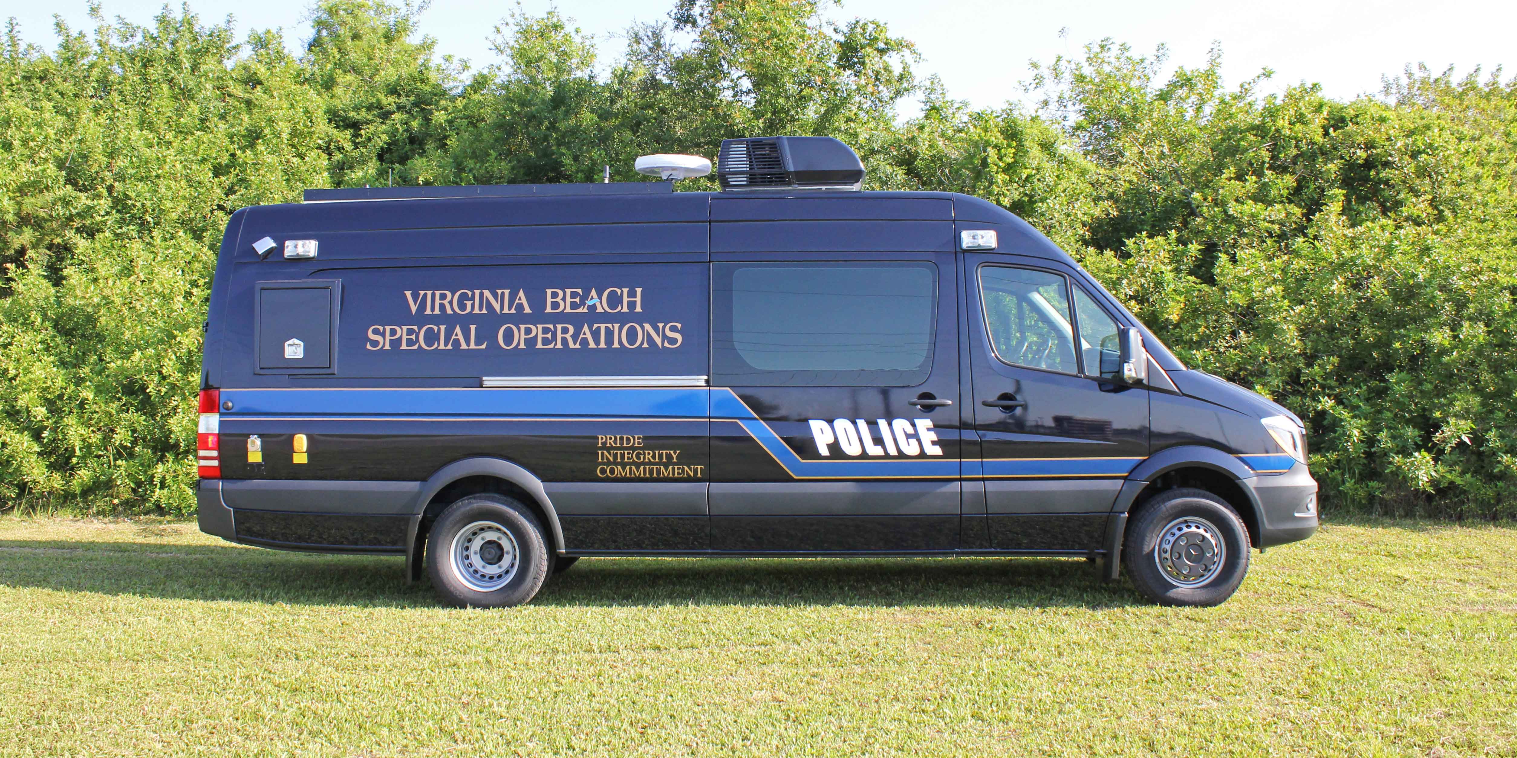 Frontline Communications Hostage Negotiation vehicle for Virginia Beach Special Operations parked outside on a sunny day.