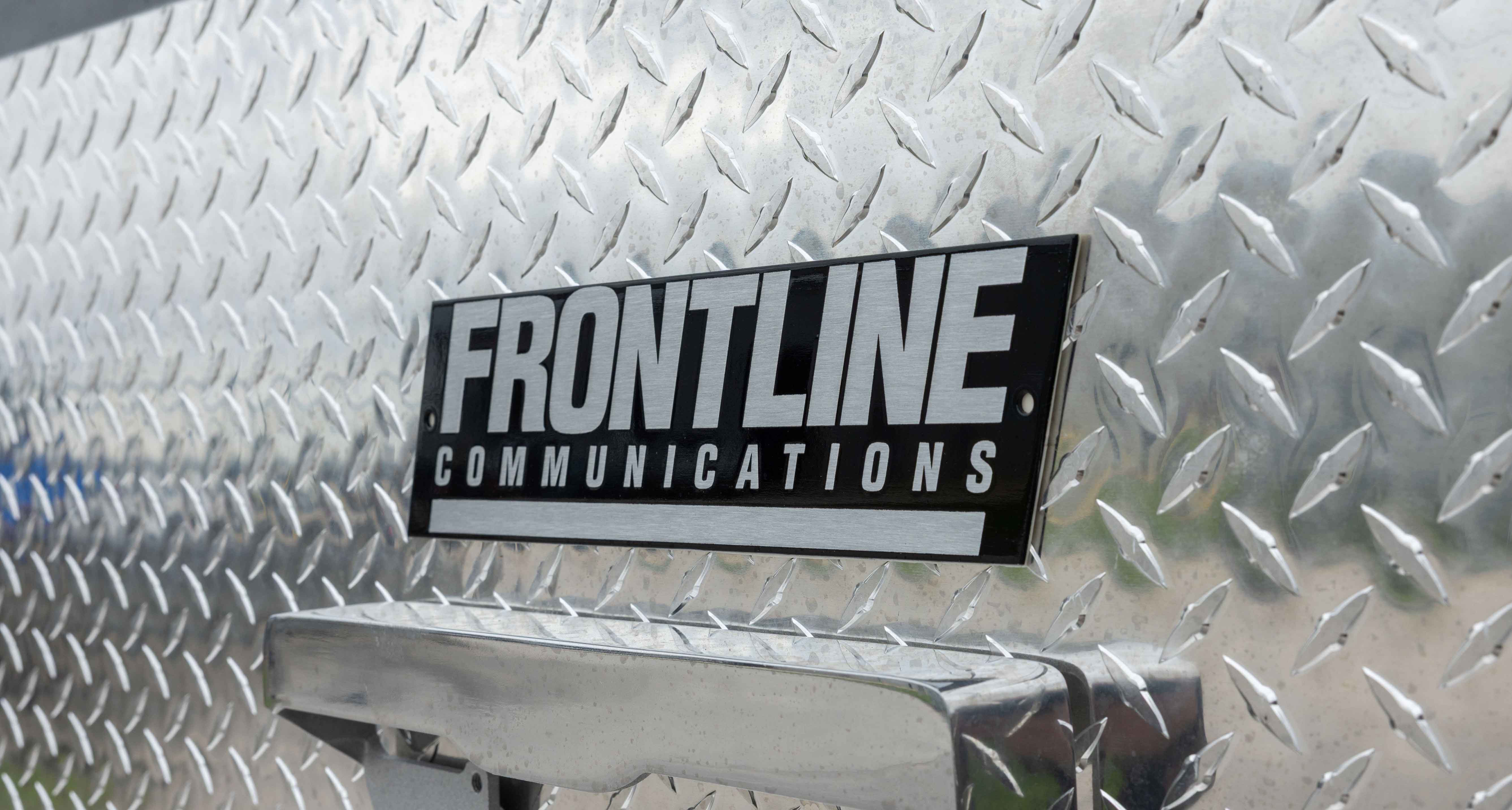 Frontline Communications Logo on a command Vehicle.